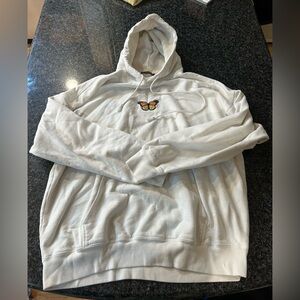 BRANDY MELLVILLE BUTTERFLY OVERSIZED HOODIE (one size fits all) has a stain